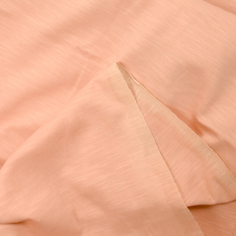 Jersey de coton flammé pêche rosé