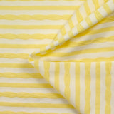 Jersey de coton rayure en texture jaune beurre et blanc