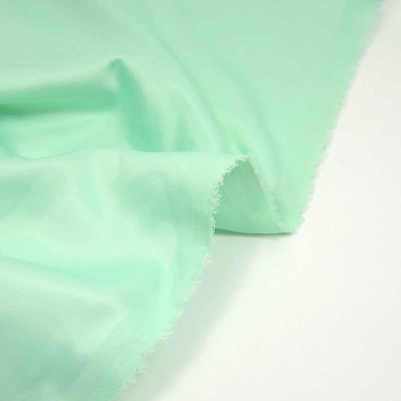 Satin polyester fin vert d'eau