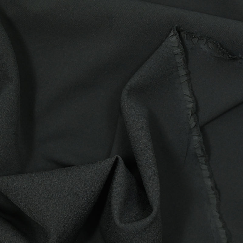 Crêpe polyester noir corbeaux
