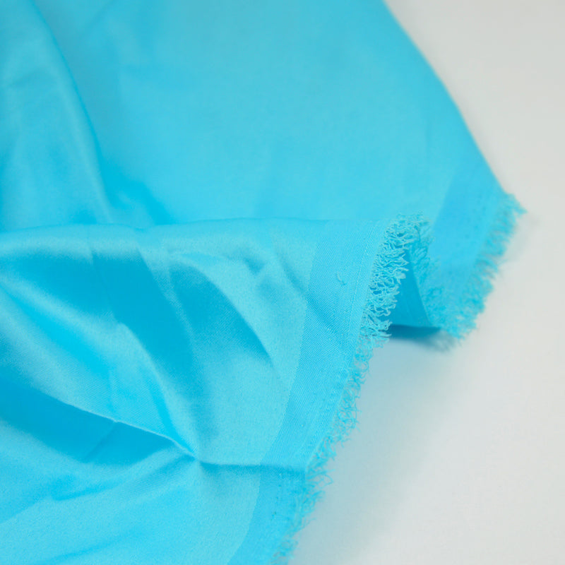 Satin polyester fin turquoise