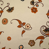 Viscose jersey printed field of orange and brown flowers on beige background