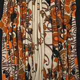 Viscose jersey printed field of orange and brown flowers on beige background