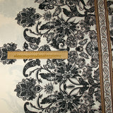 Satin polyester imprimé cachemire en frise anthracite fond écru
