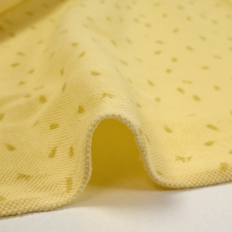 Maille polo coton imprimée sésame et lettres fond jaune