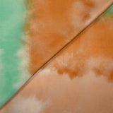 Satin polyester imprimé brume vert d'eau, orange brûlé et champagne