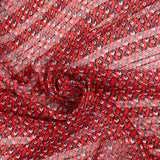 Mousseline imprimée bande satin oeil bleu fond rouge