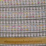 Tweed de polyester doré ligne multicolore fond blanc et rose clair