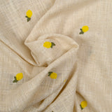 Lemon embroidered viscose linen with string background