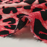 Printed viscose animal atmosphere red and pink background