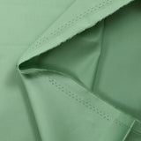 Popeline de coton satinée vert amande