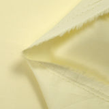 Popeline de coton satinée jaune beurre