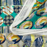 Mousseline imprimée bande satin galets de mer turquoise et vert d'eau