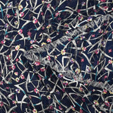 Printed muslin satin band wandering flowers navy background