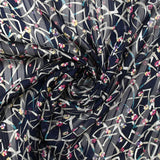 Printed muslin satin band wandering flowers navy background