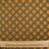Cotton sail printed rosette ocher background