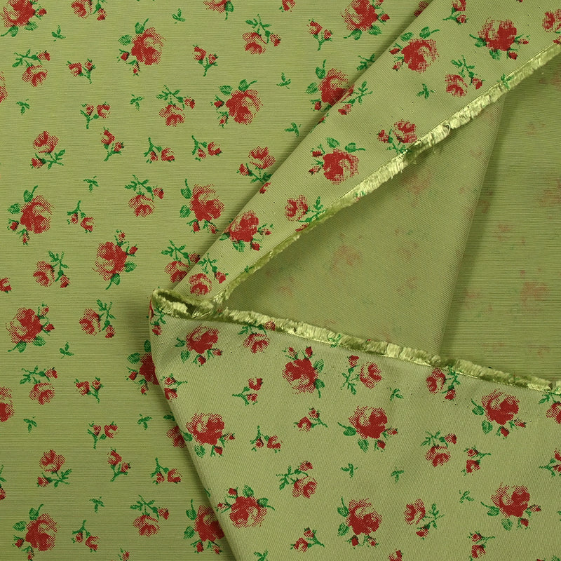 Polyviscose imprimée fleurs rouges fond vert clair