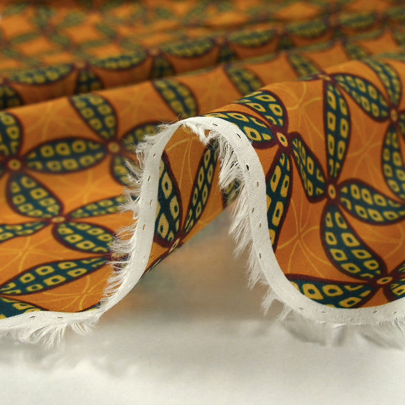 Cotton sail printed rosette ocher background