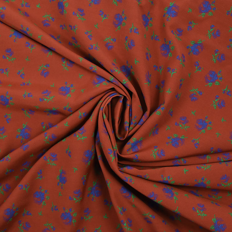 Polyviscose imprimée fleurs bleues fond brique