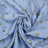 Viscose imprimée fleurette fond bleu ciel