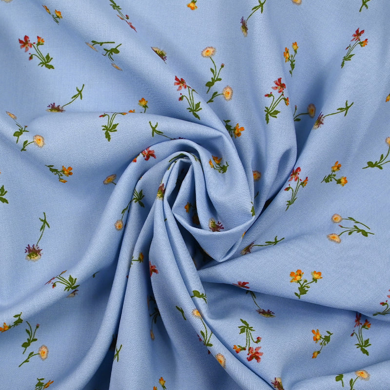 Viscose imprimée fleurette fond bleu ciel