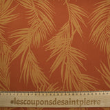 Viscose imprimée feuilles de palmier fond orange brûlé