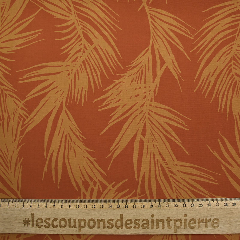 Viscose imprimée feuilles de palmier fond orange brûlé