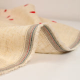 Viscose linen embroidered heart with string background