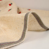 Cherry embroidered viscose linen with string background