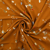 Viscose imprimée douceur fleurie fond cuivre