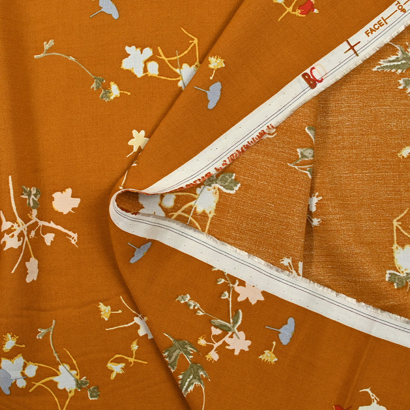 Viscose imprimée douceur fleurie fond cuivre