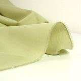 Popeline de coton unie vert tilleul