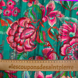 Mousseline imprimée bande satin carnaval de fleurs fond vert