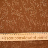 Mousseline imprimée feuille d'or fond camel