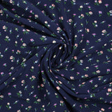 Viscose imprimée les fleurs volent fond marine