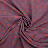 Polyviscose légère imprimée fleurs rouges fond violet