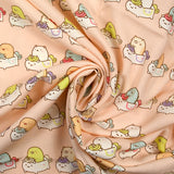 Viscose imprimée Sumikko Gurashi fond pêche