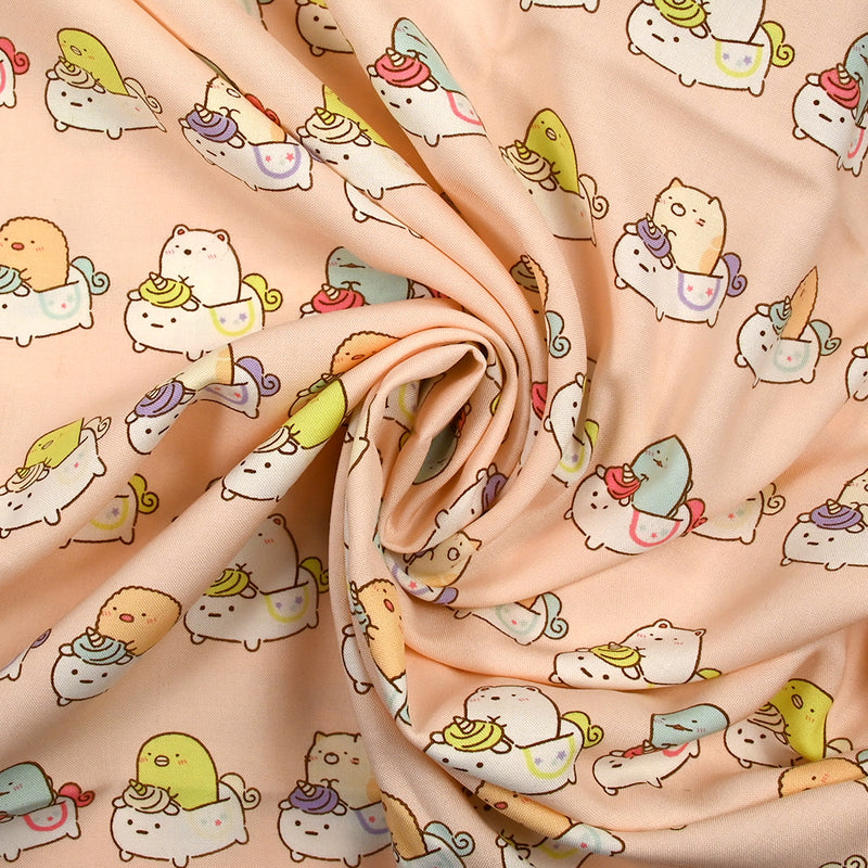 Viscose imprimée Sumikko Gurashi fond pêche