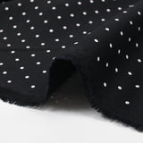 Twill de viscose imprimé à pois fond noir
