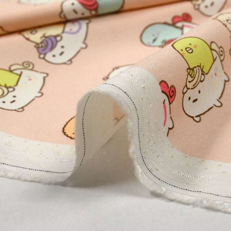 Viscose imprimée Sumikko Gurashi fond pêche