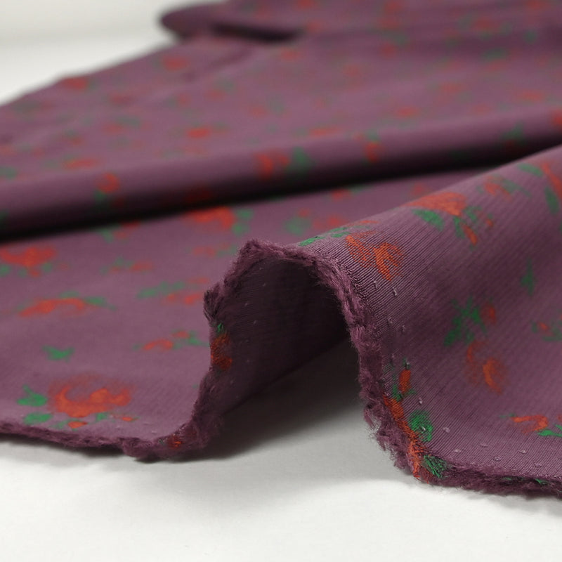 Polyviscose légère imprimée fleurs rouges fond violet