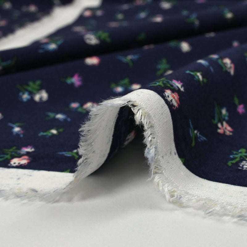 Viscose imprimée les fleurs volent fond marine