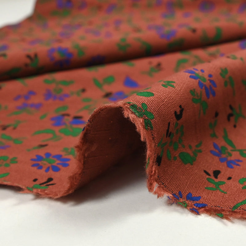 Viscose imprimée doupionnée vent de fleurs fond tomette