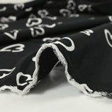Viscose légère imprimée cœurs fond noir