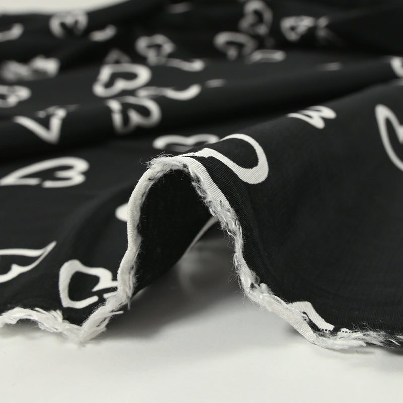 Viscose légère imprimée cœurs fond noir