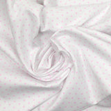 Piqué de coton imprimé coeur rose fond blanc