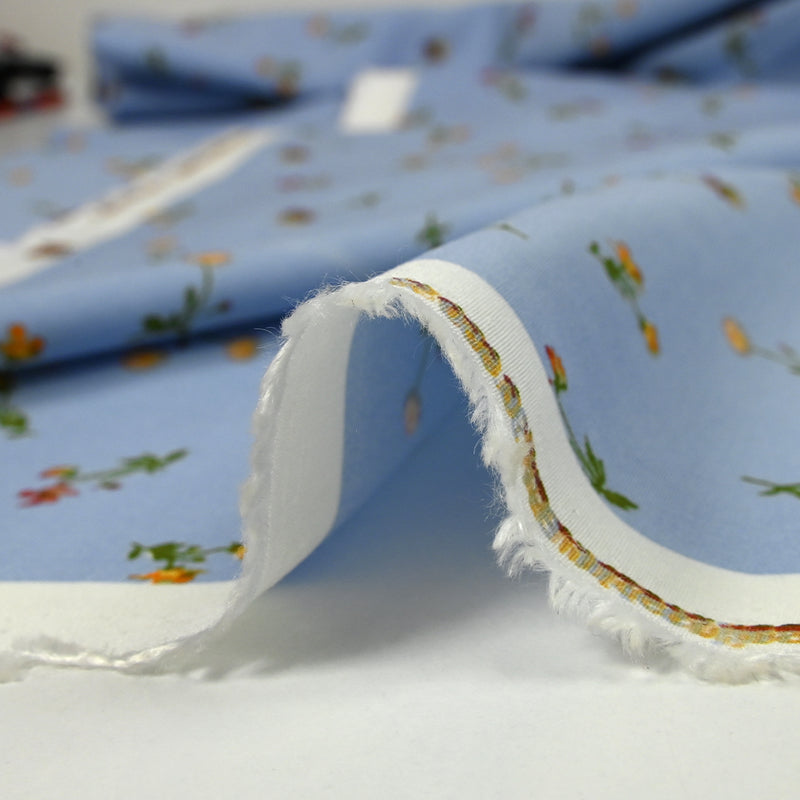 Viscose imprimée fleurette fond bleu ciel