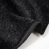 Fourrure en coton aspect astrakan noir délavé
