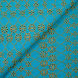 Broderie anglaise festonnée beige Clémence fond bleu azur