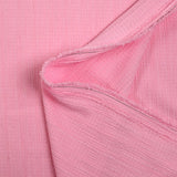 Crépon de polyester effet seersucker rose clair